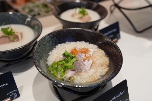 a group of bowls of food on a table at Grande Centre Point Lumphini Bangkok in Bangkok