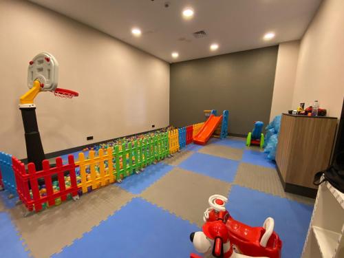 a room with a play area with a basketball hoop at Doubletree By Hilton Kars Sarikamis in Sarıkamıs
