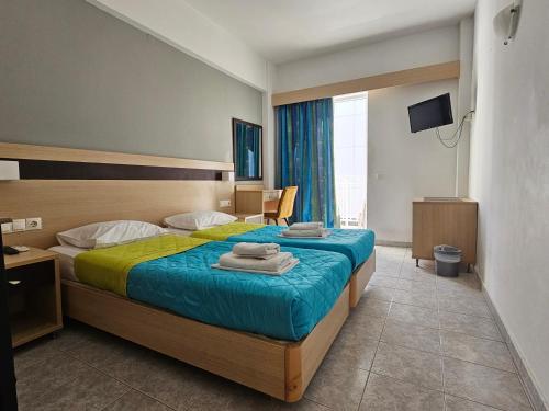 Una cama o camas en una habitación de G92 City Hotel