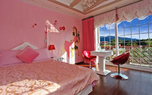 a bedroom with a bed and a sink and a window at Terrace on the Cloud in Pyeongchang