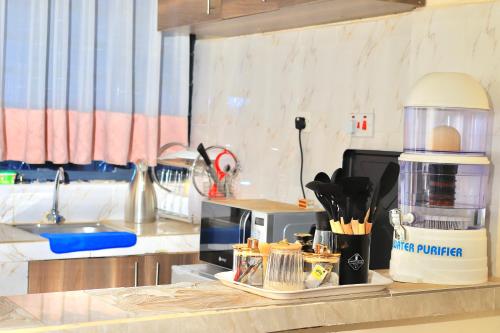 Η κουζίνα ή μικρή κουζίνα στο The Trendy Terrace, Kamakis