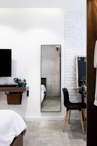 Televisyen dan/atau pusat hiburan di Stay With Me Saigon Apartment - Rivergate Building