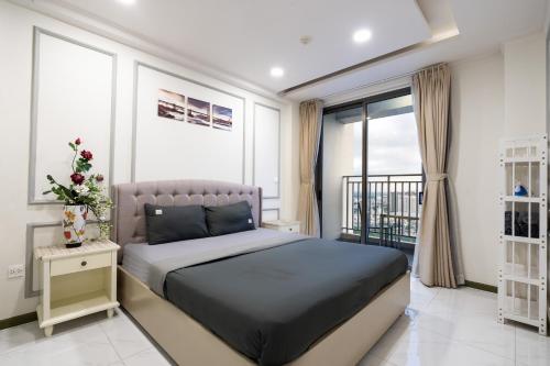 Katil atau katil-katil dalam bilik di Stay With Me Saigon Apartment - Rivergate Building