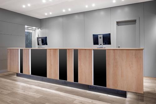 TV a/nebo společenská místnost v ubytování AC Hotel La Rioja by Marriott