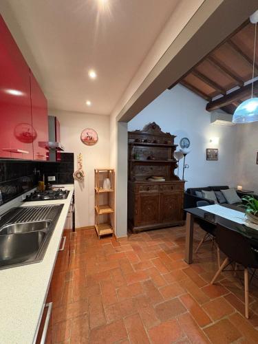 a kitchen with a sink and a counter top at Apartment Marilù in Greve in Chianti
