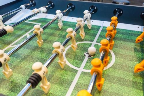 a close up of a chess board with chess players at DLS Divine River Resort and Spa, Rishikesh in Rishīkesh