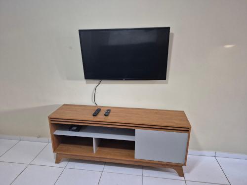 Televisyen dan/atau pusat hiburan di Casa Recanto de Unamar