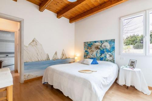 Ένα ή περισσότερα κρεβάτια σε δωμάτιο στο Italian Experience-Casa Colleoro