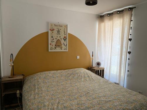 Postel nebo postele na pokoji v ubytování Maison Gite des Belles Demois Ailes