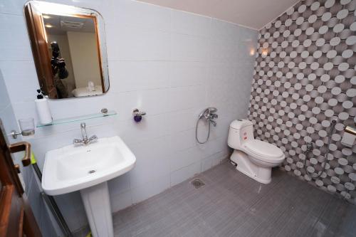 Ένα μπάνιο στο Luxvill Hotel
