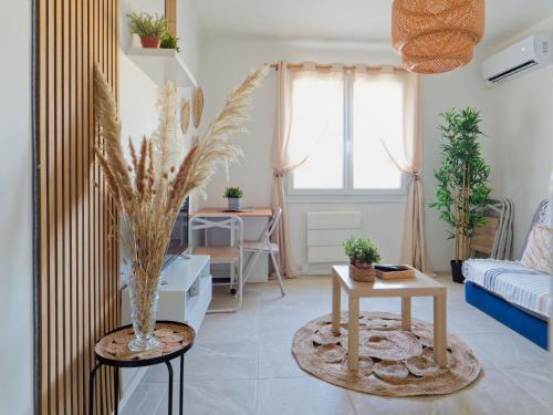 Ένα ή περισσότερα κρεβάτια σε δωμάτιο στο Appartement Martigues vue étang