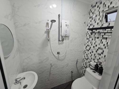 O baie la Nana Bangi Homestay