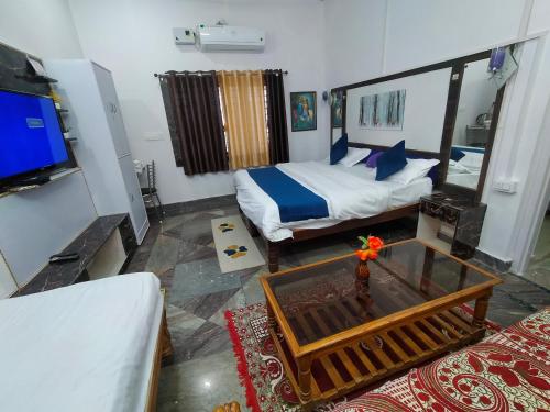 Ένα ή περισσότερα κρεβάτια σε δωμάτιο στο Eastern Gate Homestay