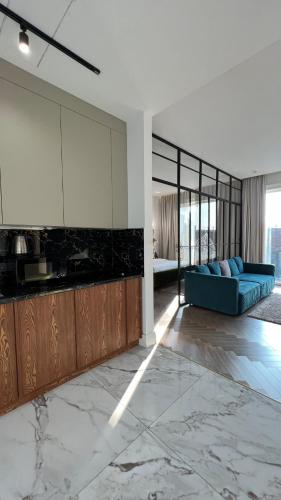 Η κουζίνα ή μικρή κουζίνα στο Hotel Manica Esentai City