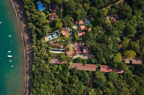 an overhead view of a house in the forest at El Mangroove Papagayo, Autograph Collection in Papagayo, Guanacaste