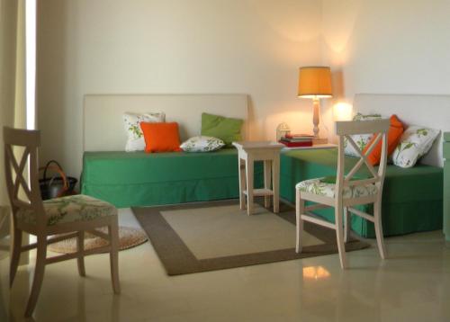 Χώρος καθιστικού στο La Foresteria di Borgogelsi Apartments