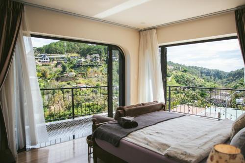 Hè Maison Boutique Stay & caféにあるバルコニーまたはテラス
