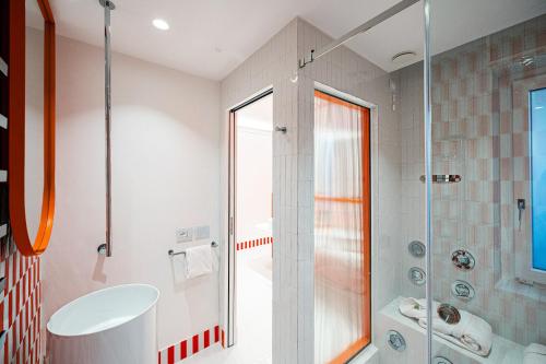 a bathroom with a shower and a sink at Pepella in Piano di Sorrento