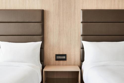 Postel nebo postele na pokoji v ubytování AC Hotel by Marriott Dallas Frisco