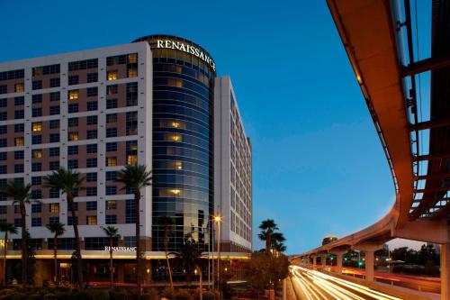 a tall building with a sign on the side of it at Renaissance Las Vegas Hotel in Las Vegas