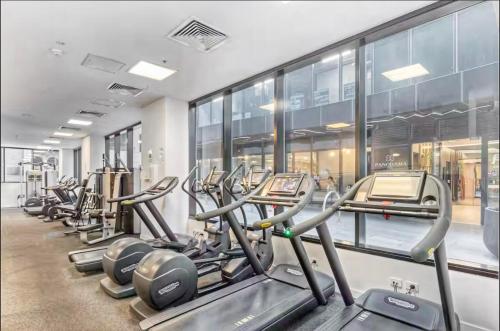 a row of cardio machines in a gym at WT917 - 2BR 2BTH in heart of box hill with free park & pool in Box Hill