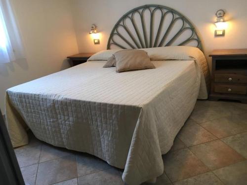 Postel nebo postele na pokoji v ubytování Villetta a schiera frontemare