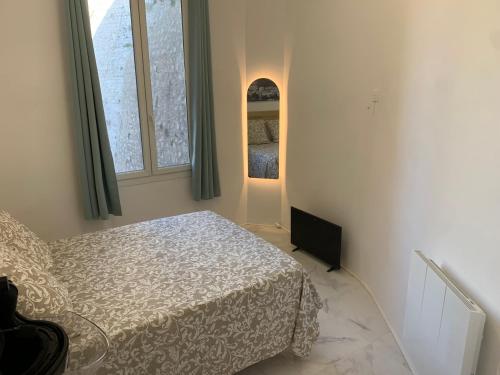 Una cama o camas en una habitación de Entre mer et Soleil !