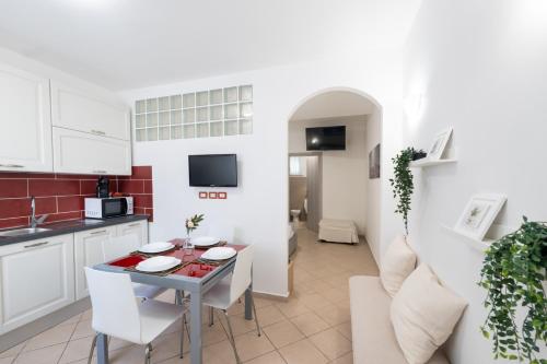 Η κουζίνα ή μικρή κουζίνα στο Easylife - Comodo monolocale vicino alla spiaggia