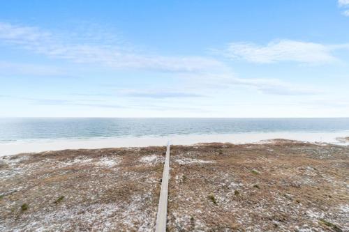 a train track on a beach near the ocean at Phoenix VII 907 in Orange Beach