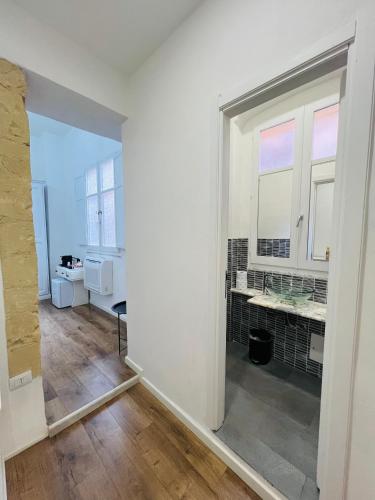 Kuchyň nebo kuchyňský kout v ubytování Sa Costixedda Rooms