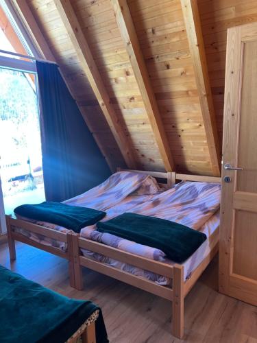 Llit o llits en una habitació de Villa Roni