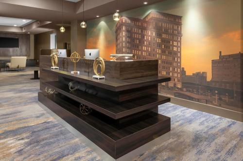 a room with a display of rings in a building at Courtyard by Marriott Dallas Downtown/Reunion District in Dallas