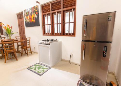 Η κουζίνα ή μικρή κουζίνα στο Holiday Penthouse Galle