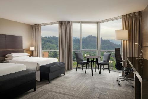Ένα ή περισσότερα κρεβάτια σε δωμάτιο στο Sheraton Santiago Hotel & Convention Center