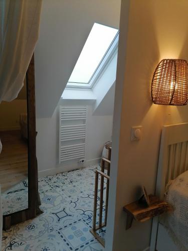 Postel nebo postele na pokoji v ubytování Le loft d'Adrien, une ode à la douc'Eure, classé 3 étoiles