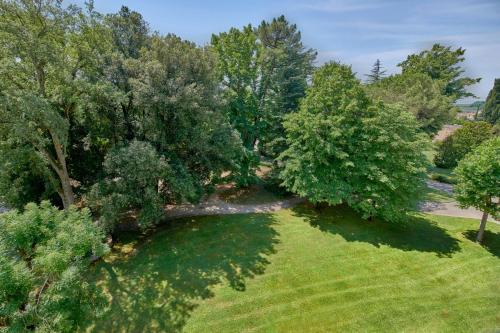 an overhead view of a garden with trees and grass at Grotta Giusti Thermal Spa Resort Tuscany, Autograph Collection in Monsummano