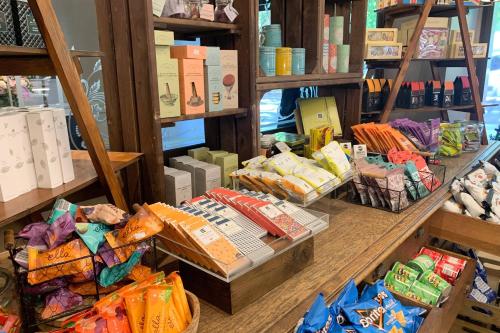 a store with a counter with different types of food at JW Marriott Grosvenor House London in London
