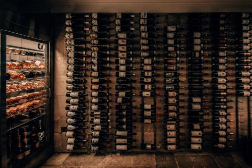 a wine cellar with a bunch of wine bottles at JW Marriott Grosvenor House London in London
