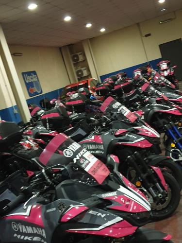 a group of motorcycles parked in a room at Hotel Futura Centro Congressi in Naples