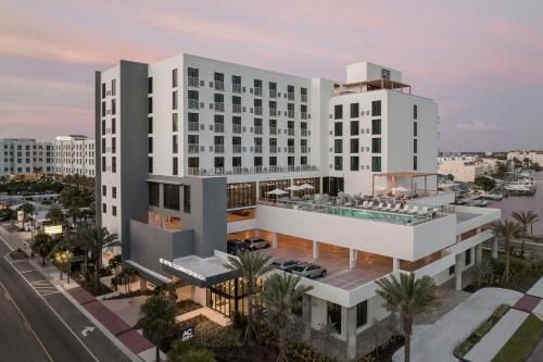 an aerial view of a building with a pool at AC Hotel by Marriott Clearwater Beach in Clearwater Beach