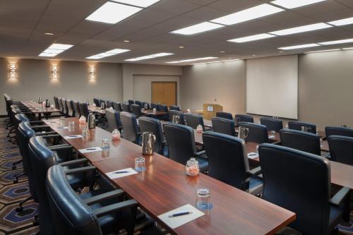 a conference room with rows of tables and chairs at Sheraton Bucks County Langhorne in Langhorne
