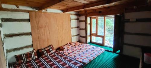Postel nebo postele na pokoji v ubytování Project Escape