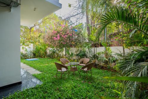 Giardino di ELIVAAS Laguna Aurelia Luxe 4 BHK Villa Near Popular Beaches With Pool & Garden