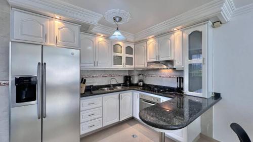 Kuchyň nebo kuchyňský kout v ubytování Apartamento equipado