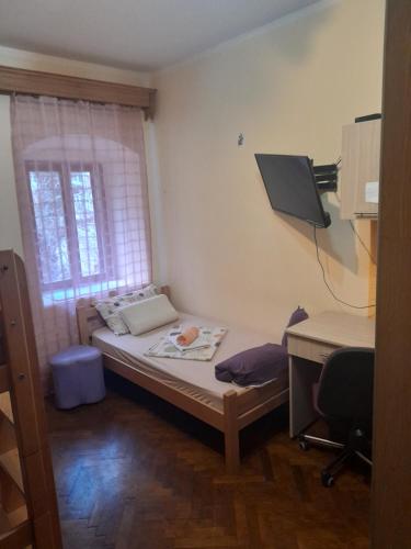 Posteľ alebo postele v izbe v ubytovaní Centar Starog Grada