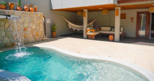 Bazén v ubytování Carnaúba Hotel Boutique nebo v jeho okolí
