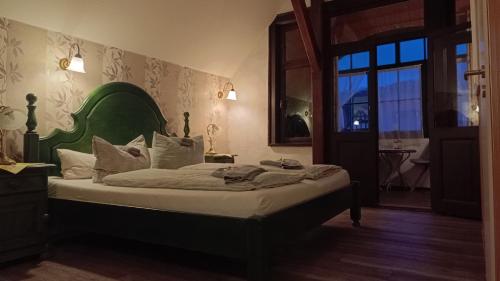 Кровать или кровати в номере Hotel Villa Alice