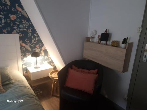 Un ou plusieurs lits dans un hébergement de l'établissement Les chambres de l'auberge