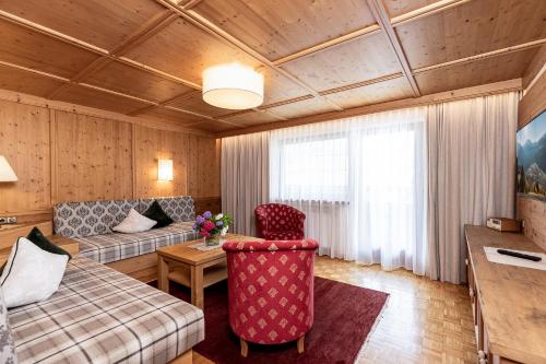 Postel nebo postele na pokoji v ubytování Aparthotel Landhaus St. Joseph (Indoor Pool)