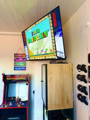 Télévision ou salle de divertissement dans l'établissement Goethes Haus